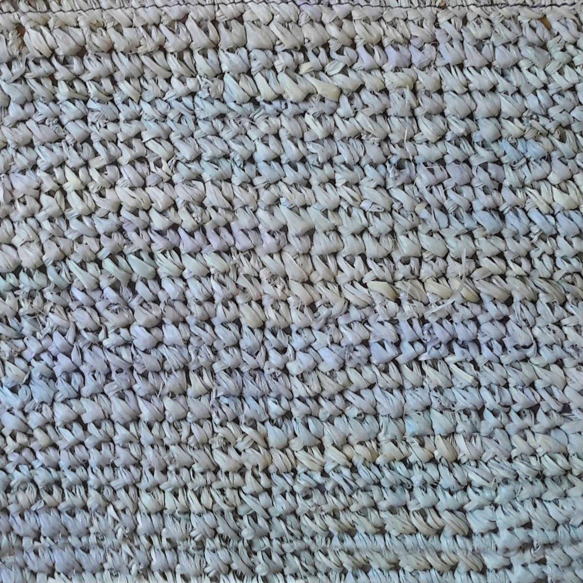 Bastbeutel mit Pompons