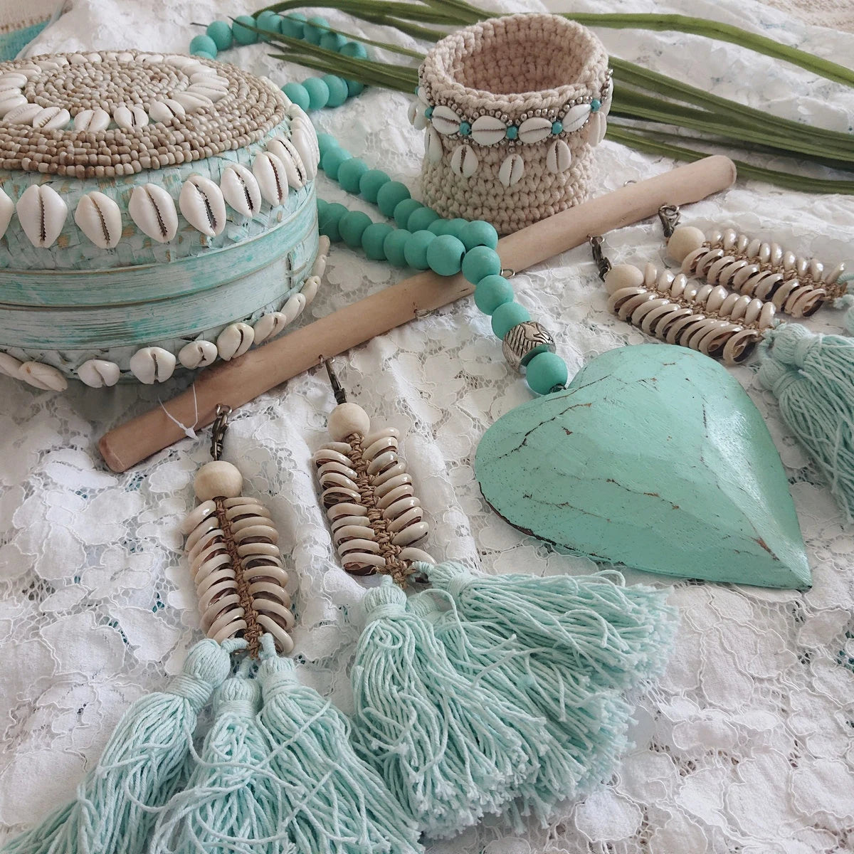Muschel Schlüsselanhänger mit Pompons