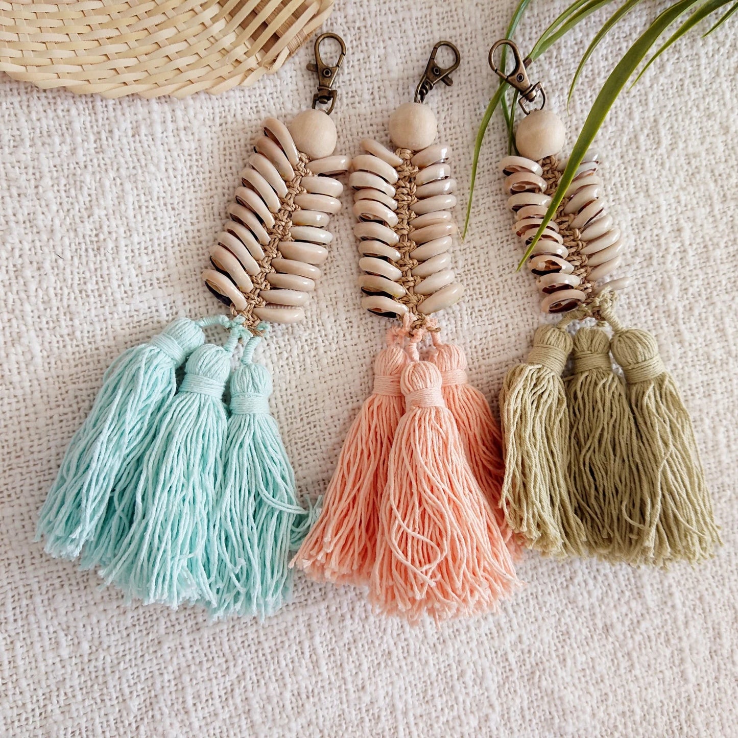 Muschel Schlüsselanhänger mit Pompons