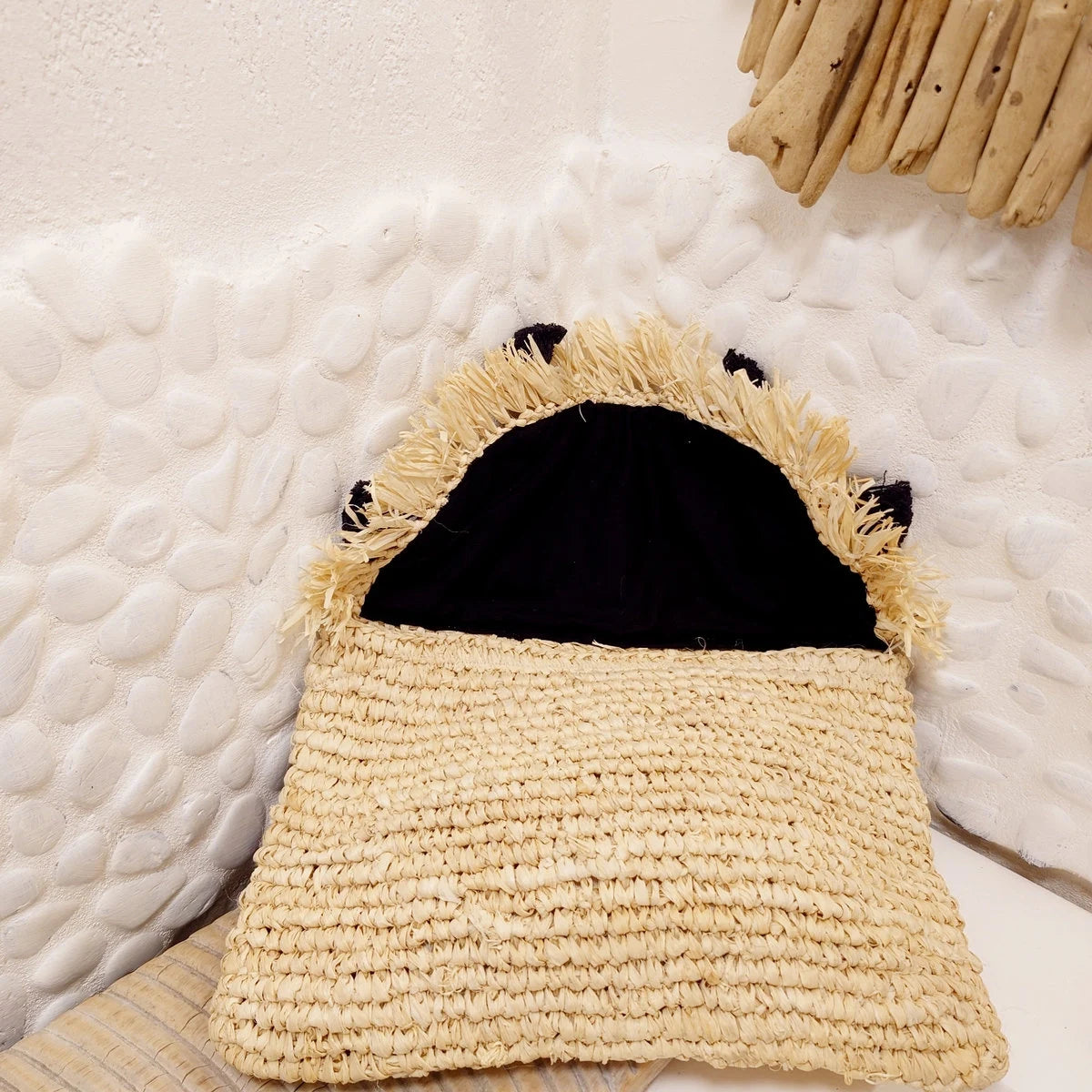 Sacchetto in rafia beige con pompon neri - Collezione Bona