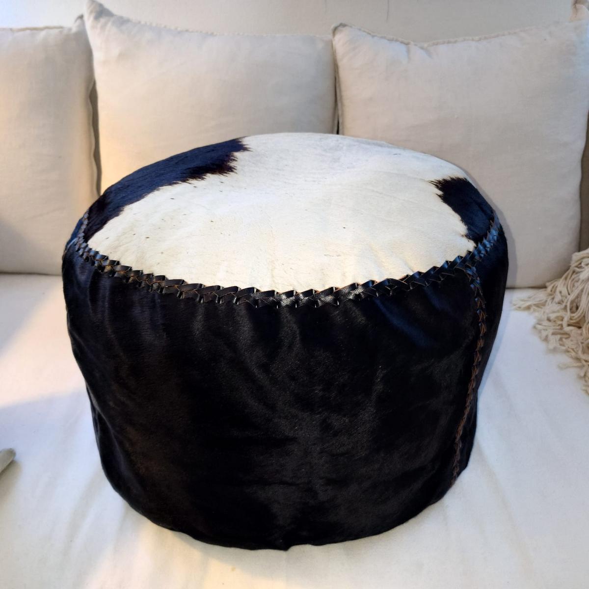 Pouf rond en peau de vache
